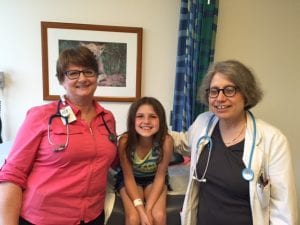 Baylee with some of her treatment team at UNC Chapel Hill. Through it all, Baylee and her family fight with smiles on their faces.