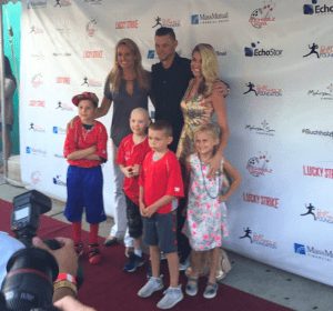Carla Tardif with Clay and Lindsey Buchholz and the children being honored at the Buchholz Bash in July 2016. 
