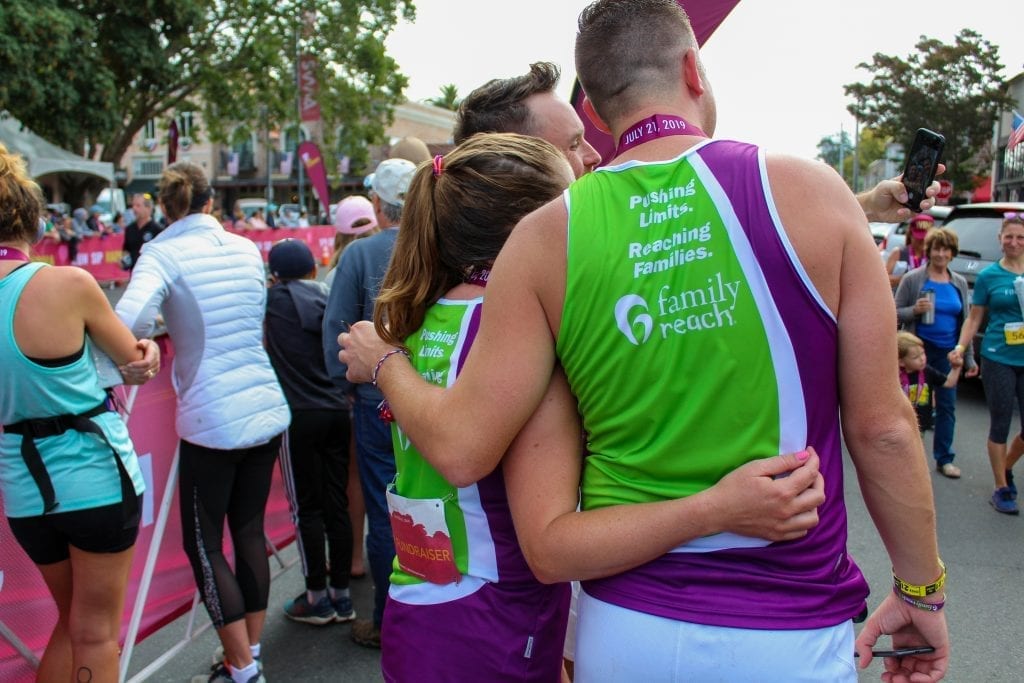 More members of the team sharing in the joy of crossing the finish line