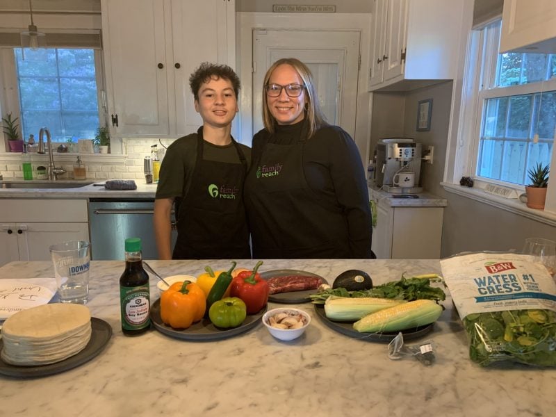 Cancer hero MK with his mom Raquel in the kitchen